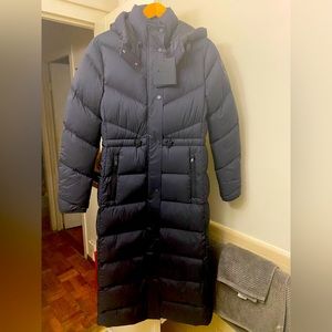 Moose knuckles long coat. ( price negotiable/ make an offer)